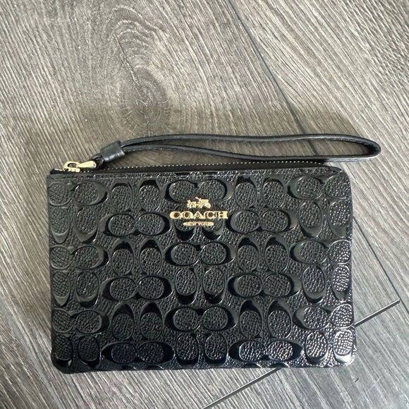 Coach Handbags - Coach Embossed Black Wristlet